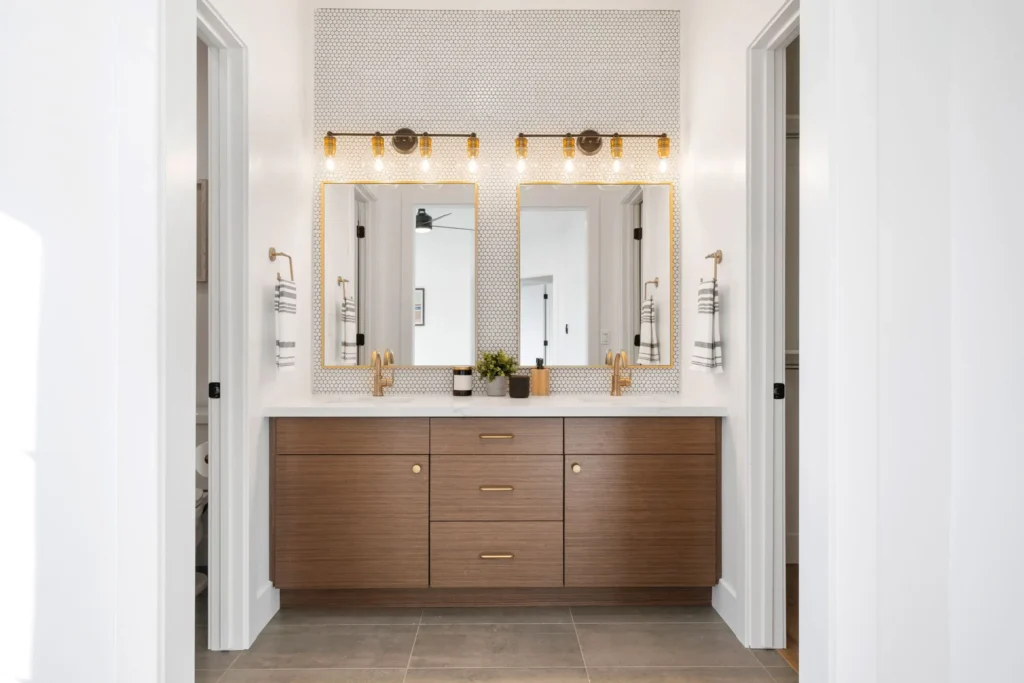 A functional and beautiful bathroom with light fixtures, faucet, and tiles that work for your personal style and lifestyle is easier to achieve than you may think with 4SeasonsHome's bathroom remodel service.
